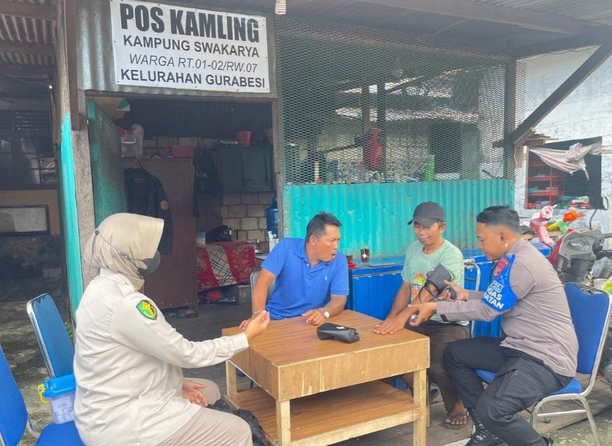 Personel Subsatgas Keladi Sagu ORC 2025 Polresta Jayapura Kota mengelar kegiatan sambang sekaligus memberikan bakti kesehatan